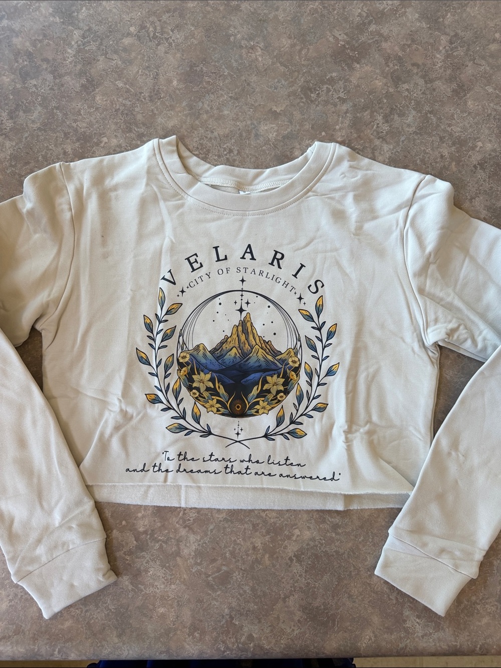 Velaris City of Starlight Graphic Crop Sweatshirt - Cream with Blue & Gold Print